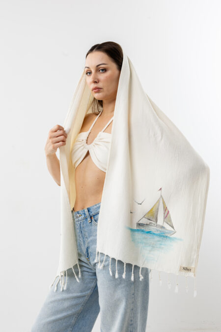 artisanal hand-painted sail boat cotton scarf and shawl; nautical design handcrafted wrap for sustainable resort wear, travel, and coastal style.