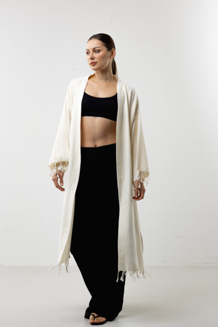 Hand-painted black feather wrap long kimono; bohemian natural cotton robe and dress for sustainable resort wear, travel, and all-season style.