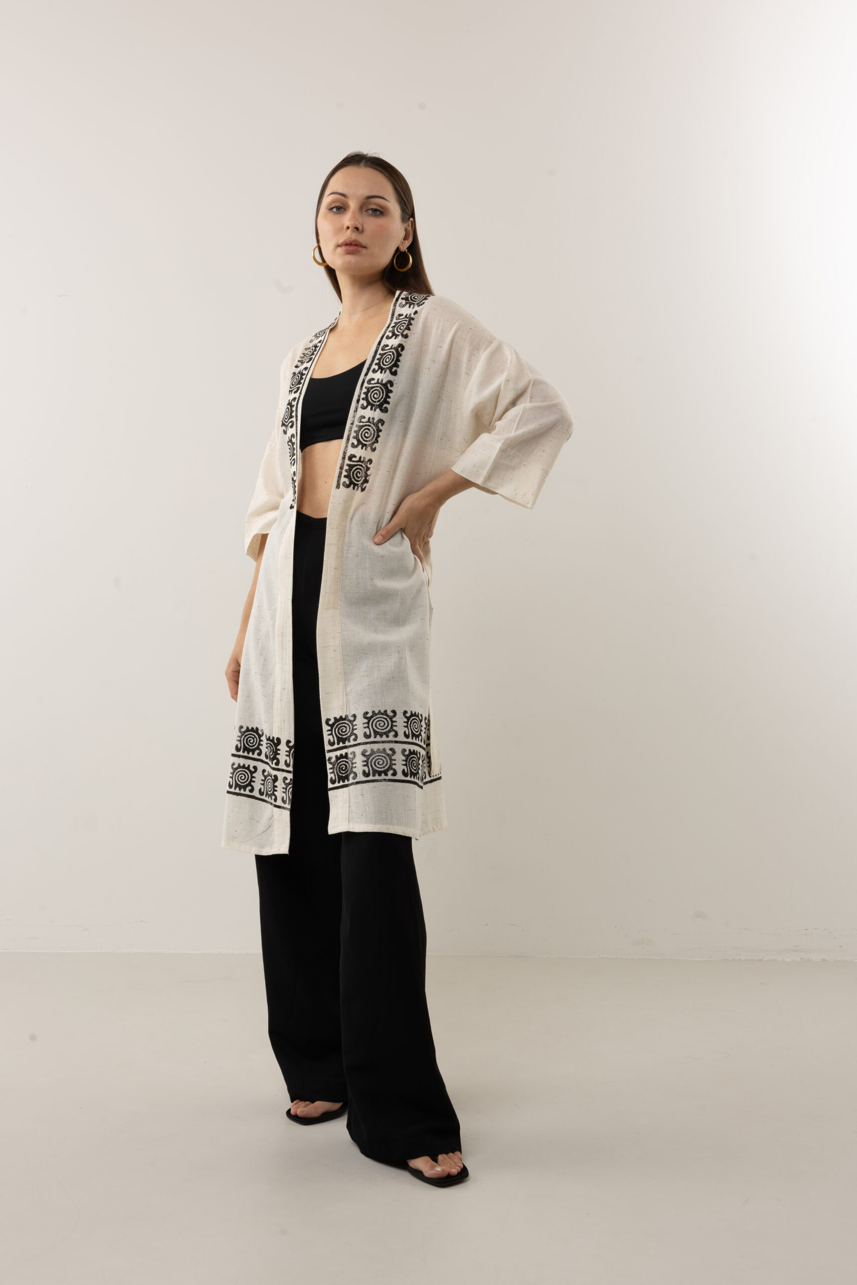 Speckled linen-cotton kimono with black hand-pressed celestial symbols.