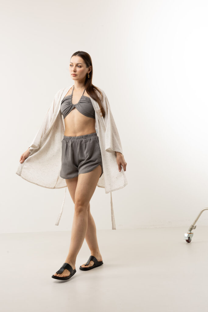 Double-layer muslin shorts and bustier set; sustainable cotton two-piece lounge wear, breathable organic summer set, and minimalist resort wear.