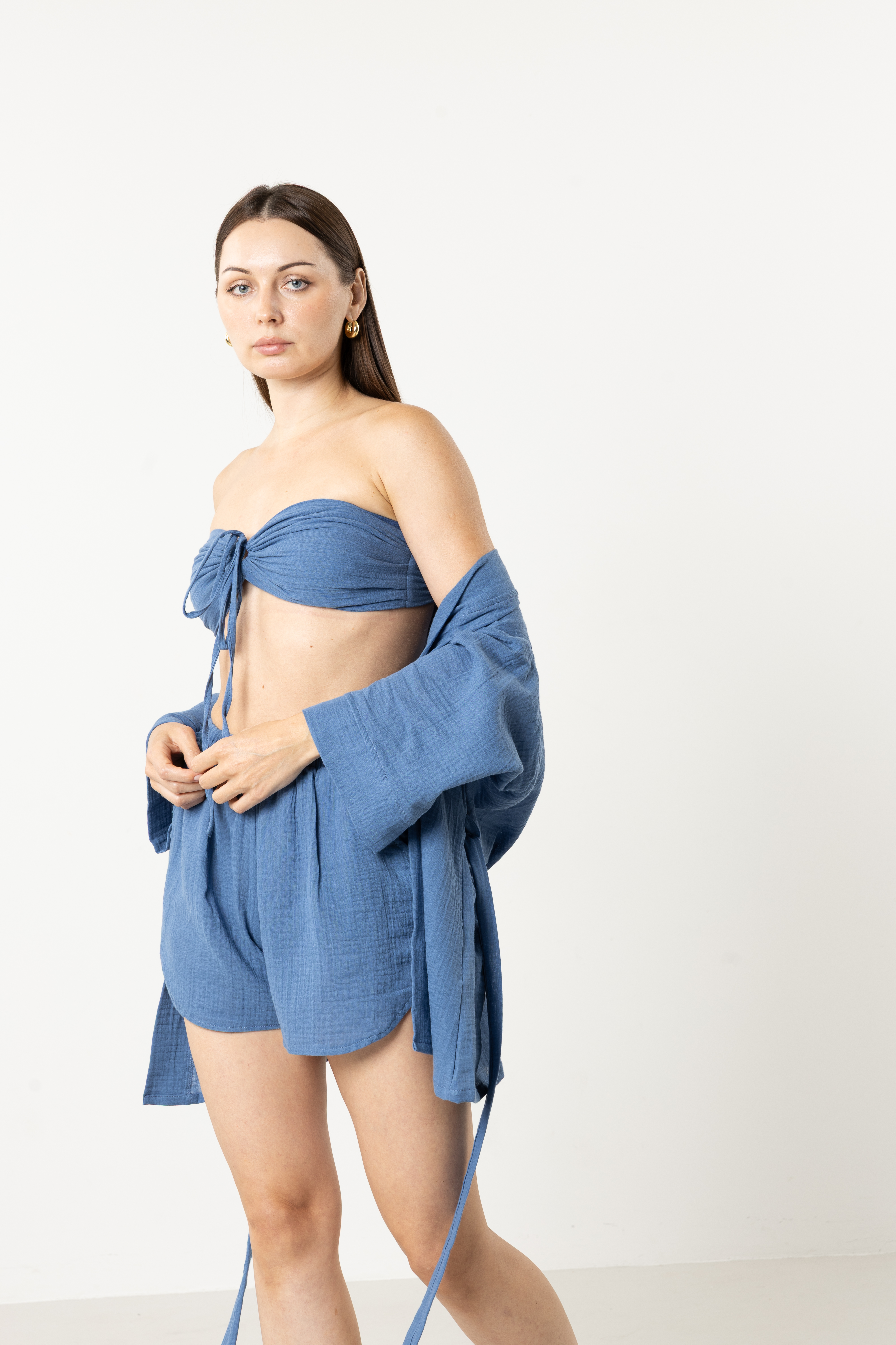 Double-layer muslin shorts and bustier set; sustainable cotton two-piece lounge wear, breathable organic summer set, and minimalist resort wear.