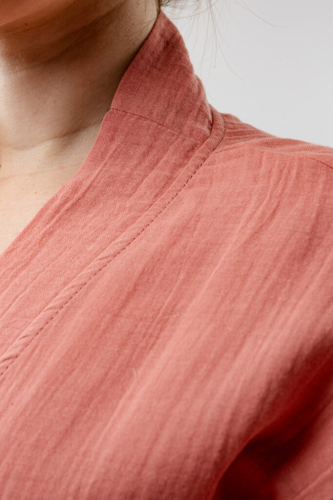 Double-layer muslin shorts and bustier set; sustainable cotton two-piece lounge wear, breathable organic summer set, and minimalist resort wear.