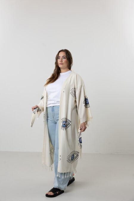 Hand block printed blue cotton long kimono with black artisanal evil eye motifs.