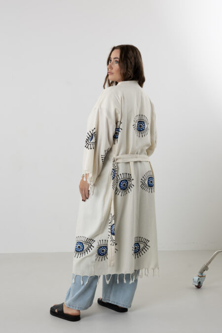 Hand block printed blue cotton long kimono with black artisanal evil eye motifs.