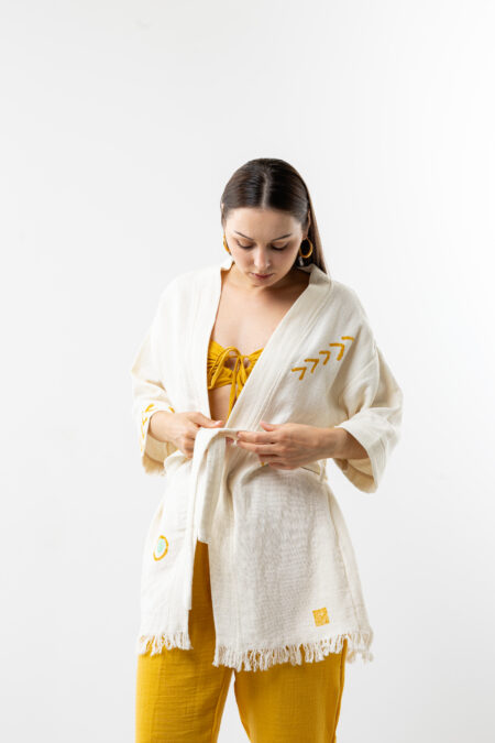 Golden Bloom yellow floral cotton short wrap kimono; belted waist jacket for sustainable resort wear, travel, and all-season bohemian style.