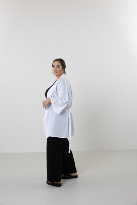 Hand-painted zodiac mini muslin kimono; multi-color naturally dyed jacket with black celestial symbols for sustainable resort wear and travel.