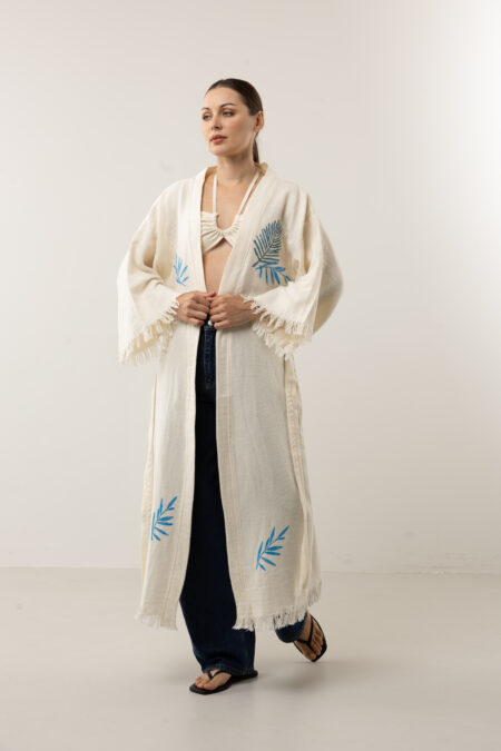 Full-length indigo artisanal cotton kimono with handcrafted leaf patterns.