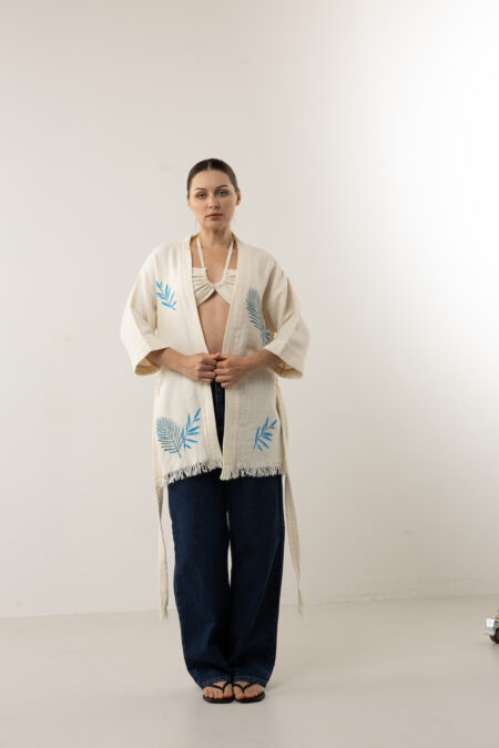 Short artisanal cotton kimono with dual-tone indigo leaf prints and waist tie.