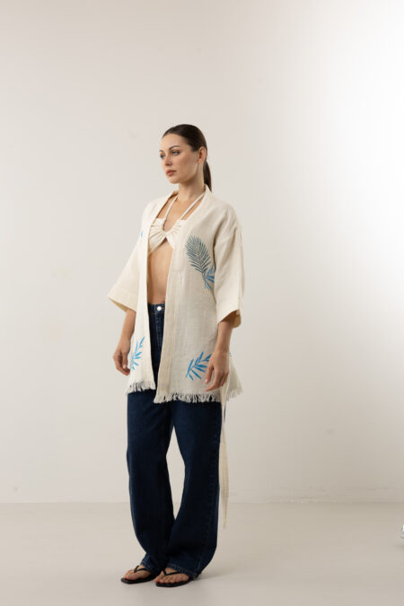 Short artisanal cotton kimono with dual-tone indigo leaf prints and waist tie.