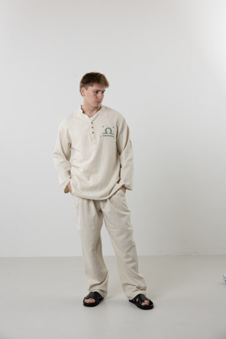 Men’s natural cream Henley shirt with hand-painted Libra zodiac symbol.