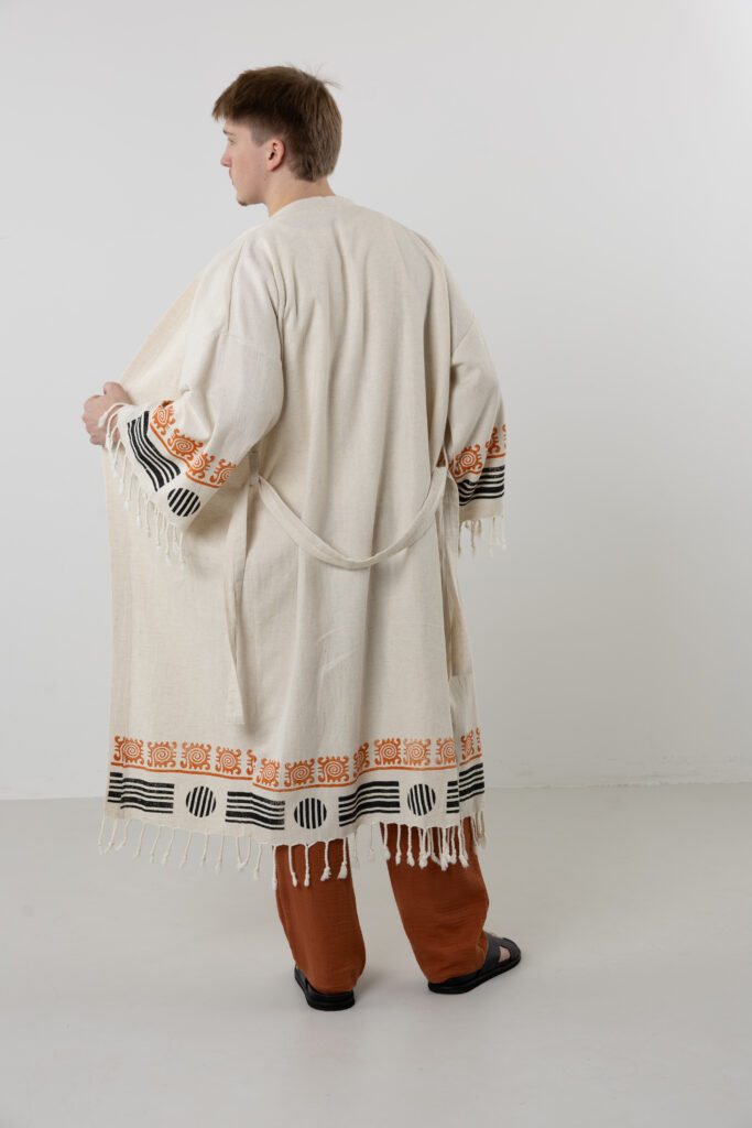 Back view of long linen kimono with minimalist woodblock pattern.