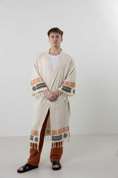 Minimalist cream linen long kimono with brown woodblock symbols.
