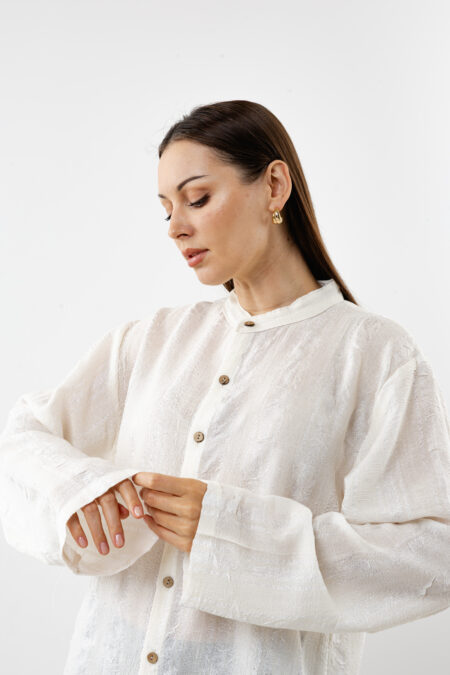 Detail of the lustrous silk-cotton fabric on the Starlight shirt.