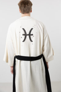 unique-artisanal-zodiac-hand-paintedn-natural-cotton-long-kimono-pisces Unique hand-painted zodiac sign natural cotton long kimono; unisex artisanal black and cream duster for sustainable bohemian style and mystical loungewear.