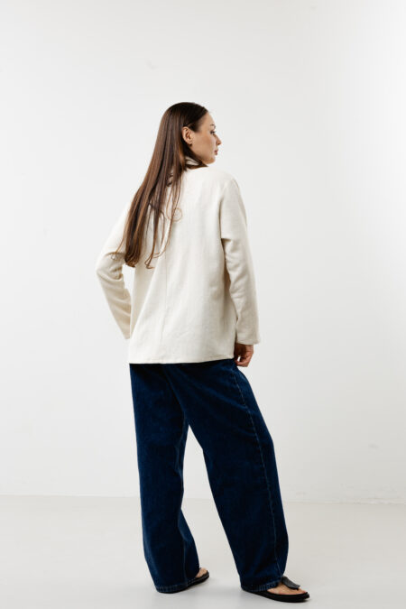 Back view of women’s premium linen-cotton shirt showing the elegant drape and clean silhouette.